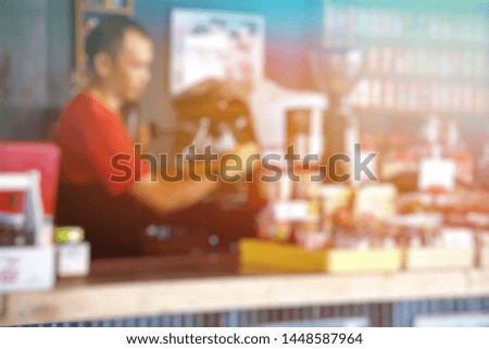 Blurred images of coffee shops in vintage style  With beautiful light