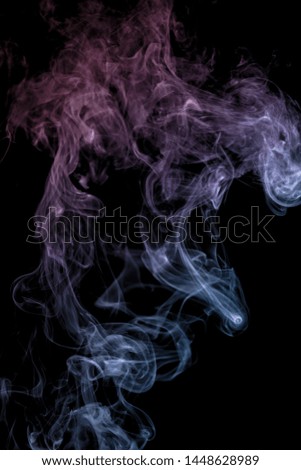Colorful smoke on dark background