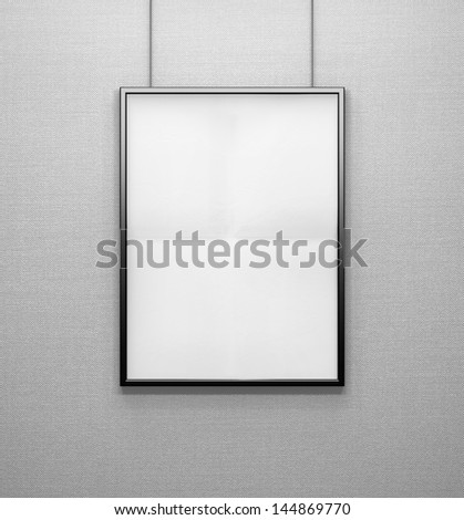 blank frame on a grey wall