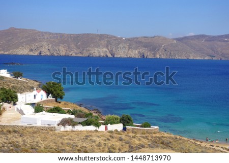 Photo from tranquil and famous small cove and sandy beach of Agios Sostis, Mykonos island, Cyclades, Greece