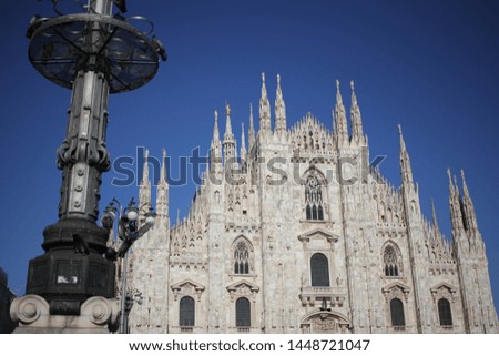 The Piazza del Duomo milano, Famous white Architectural cathedral church under blue sky at Milan, The largest church in Italy, travel destination backgrounds