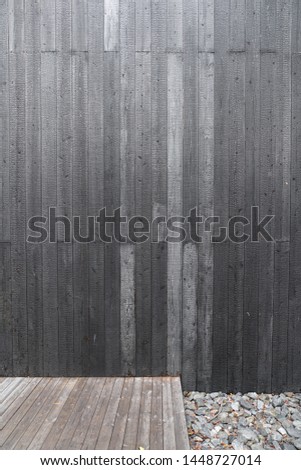 Scene of burned natural wood plank panel texture with natural weatherd wood deck in modernism style / black wood / background texture