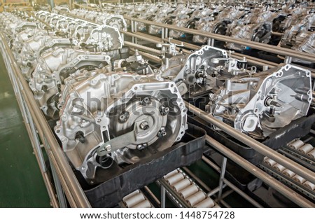 Automotive parts steel, Gear spare part, Car engine part supply. Royalty-Free Stock Photo #1448754728