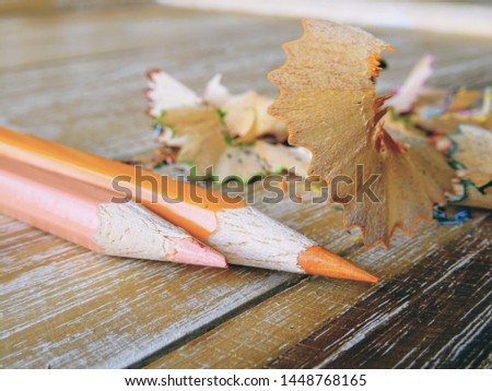 Colorful crayons on the wooden table