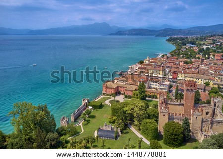 Panoramic view of the city center of Lazise on Lake Garda, Italy. Aerial photography with drone.