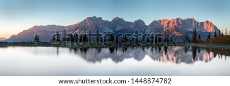 Wilder Kaiser on a lake in Going Royalty-Free Stock Photo #1448874782