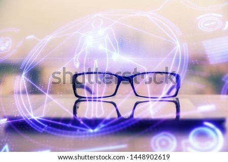 Science drawing with glasses on the table background. Concept of education. Double exposure.