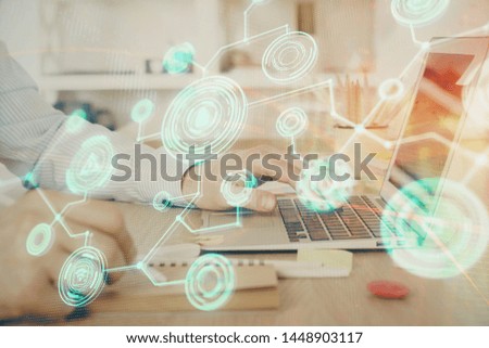 Social network theme hologram with businessman working on computer on background. Concept of world wide web. Multi exposure.