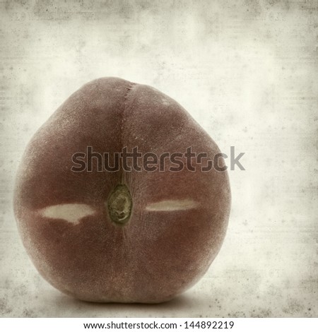 textured old paper background with red donut peaches
