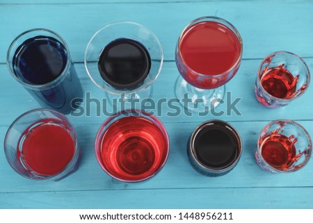 close up summer drinks in glasses on wood table and copy space