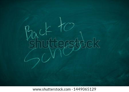 Green Chalkboard. Chalk texture back to school board display for background. chalk traces erased with copy space for add text or graphic design. Backdrop of Education concepts.