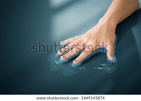 future technology, security and identification concept - hand using interactive panel touch screen with fingerprint scanning system Royalty-Free Stock Photo #1449145874