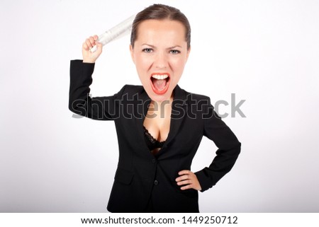 angry woman in suit with big head holding a rolled up newspaper