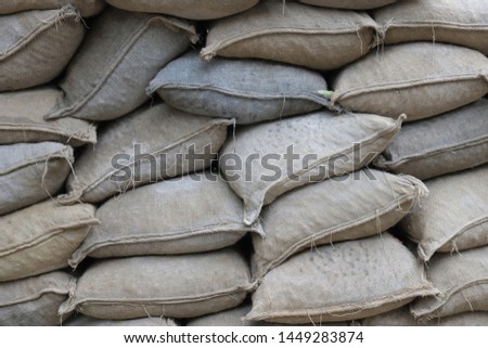 A lot of stocked sacks. Texture background.