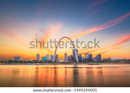St. Louis, Missouri, USA downtown cityscape on the Mississippi River at twilight.  Royalty-Free Stock Photo #1449294005