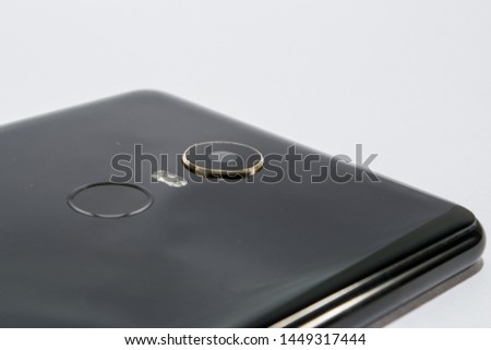 
real photo of a cell phone on white background