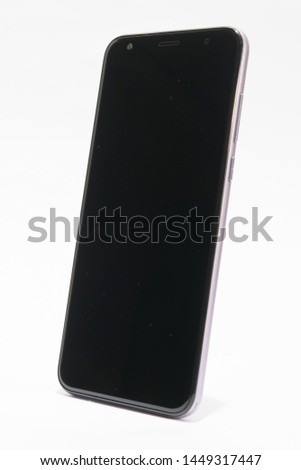 
real photo of a cell phone on white background