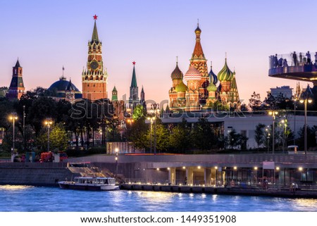 Moscow Kremlin and St Basil`s Cathedral at night, Russia. Zaryadye Park on embankment of Moskva River. Beautiful panorama of the Moscow city center at dusk. Evening view of the Moscow landmarks. Royalty-Free Stock Photo #1449351908