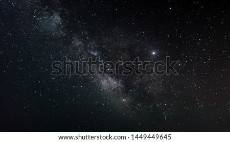 Milky Way in the night sky Royalty-Free Stock Photo #1449449645