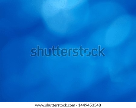 circle light blue on dark blue background