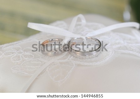 Closeup of silver wedding rings