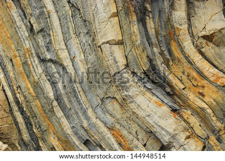 Wall of sedimentary rock, Cinque Terre, Liguria, Italy Royalty-Free Stock Photo #144948514