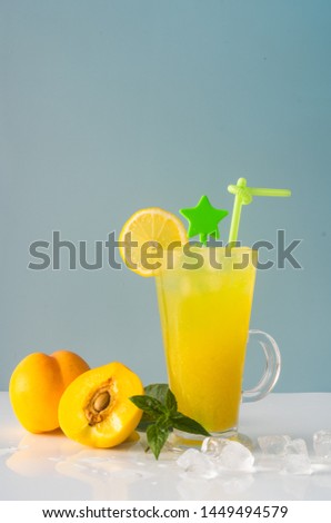 Fresh, pure background, fresh lemon, squeezed yellow peach juice