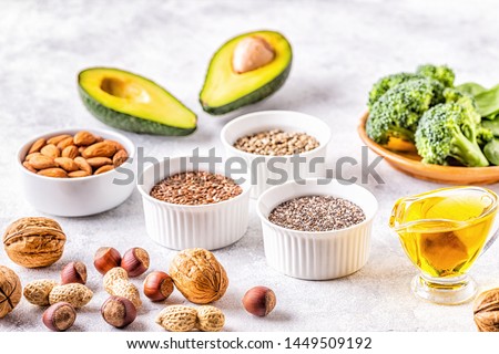 Vegan sources of omega 3 and unsaturated fats. Concept of healthy food. Royalty-Free Stock Photo #1449509192