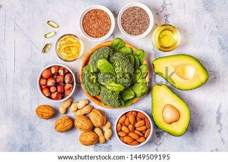 Vegan sources of omega 3 and unsaturated fats. Concept of healthy food. Top view. Royalty-Free Stock Photo #1449509195