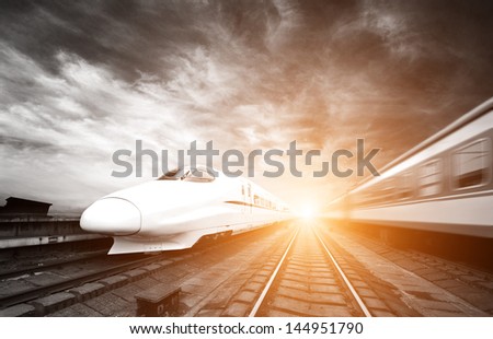 two modern high speed train with motion blur Royalty-Free Stock Photo #144951790