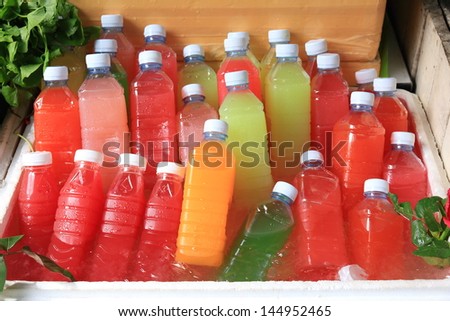 Mixed Ice Cold Juice Bottle. Royalty-Free Stock Photo #144952465