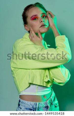 woman with make up neon studio fashion