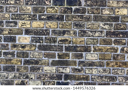 Close up view on old and weathered red  and yellow brick walls in high resolution