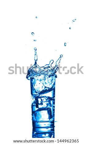 Water splashes in the glass on white background
