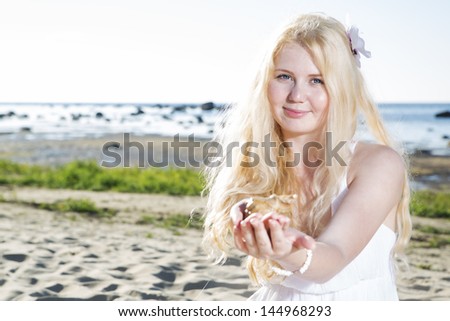 Young woman share view of clam with us