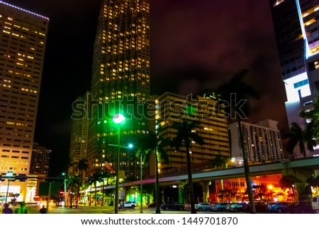 Skyscrapers and monorail track in downtown Miami at night. Southern Florida, USA