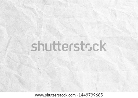 Old crumpled grey paper background texture
