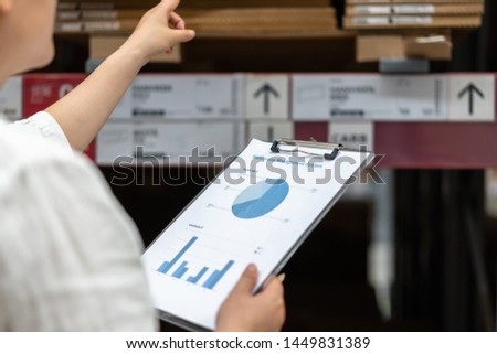 worker working in warehouse with tablet