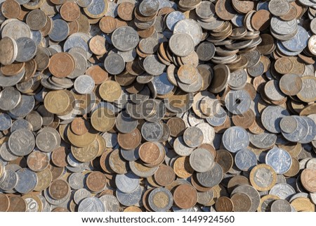 Old vintage coins background for sale for tourists in the Ukrainian market on the street in Kyiv, Ukraine. Close up, top view