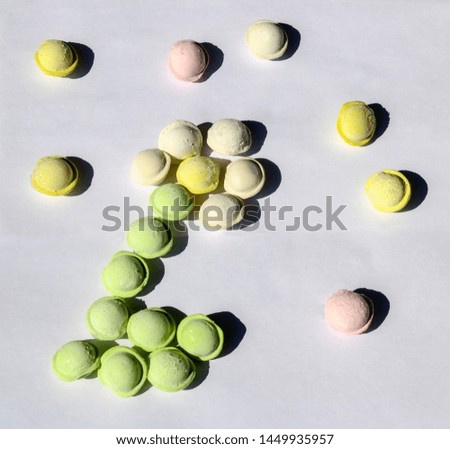 small colored dumplings on a white background. food for children, festive and Christmas parties.