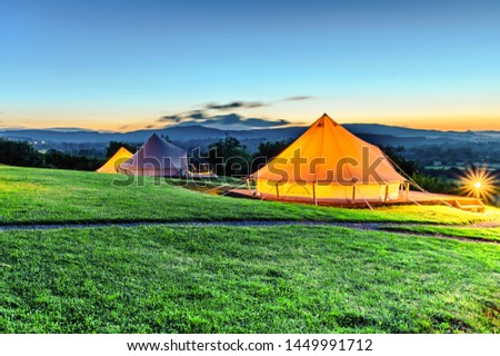 Picture tents during the sunset at the camp