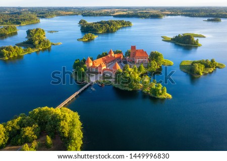 Trakai castle in Lithuania aerial view. Green islands in lake in Trakai near Vilnius. Trakai drone view Royalty-Free Stock Photo #1449996830