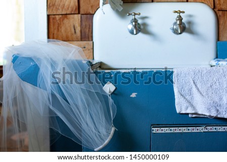 White Bridal Veil by Old Vintage Blue Sink