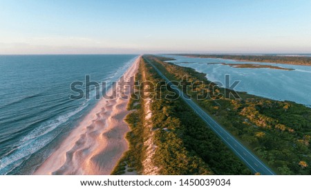 aerial view of road near beach