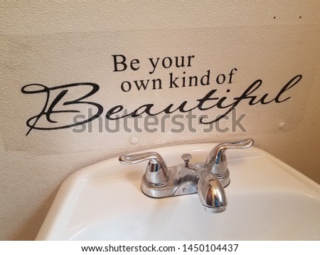 be your own kind of beautiful sign and bathroom sink