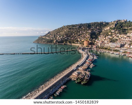 The Alanya castle over the rocky peninsula in the middle of the city. The fortress is a remain of 13th century Seljuk fortress built after the conquest of Alanya in 1220.
