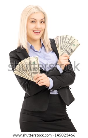 Happy female in black suit holding US dollars isolated on white background