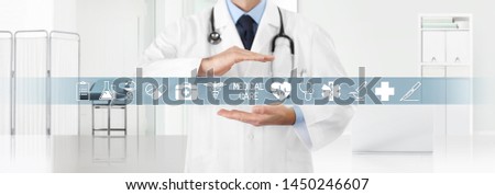 medical coverage insurance concept, hands doctor covering symbols and icons with the clinic in the background, copy space and web banner template 