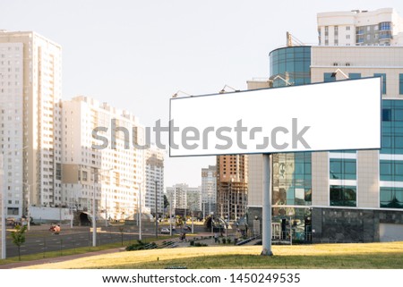 Mock up, billboard on the road. Cityscape, morning background