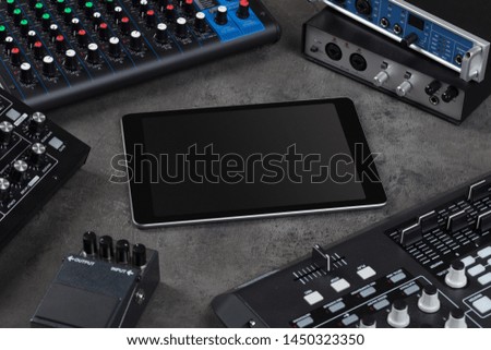 Empty tablet and electronic music instruments
